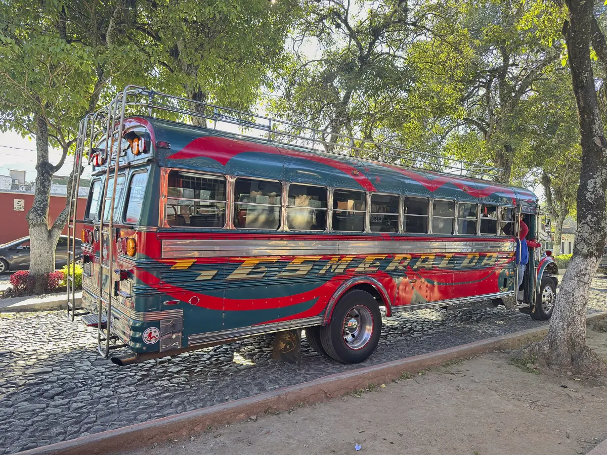 A brightly painted chicken bus in Antigua