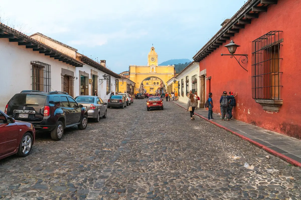 A cobblestone street leading to the Santa Catalina Arch