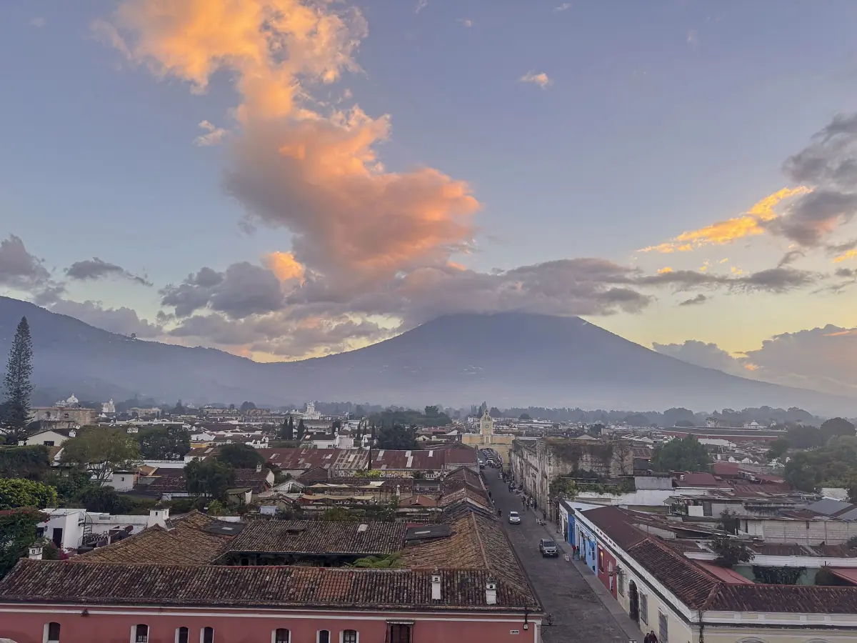 Volcán de Agua at sunset above Antigua's rooftops